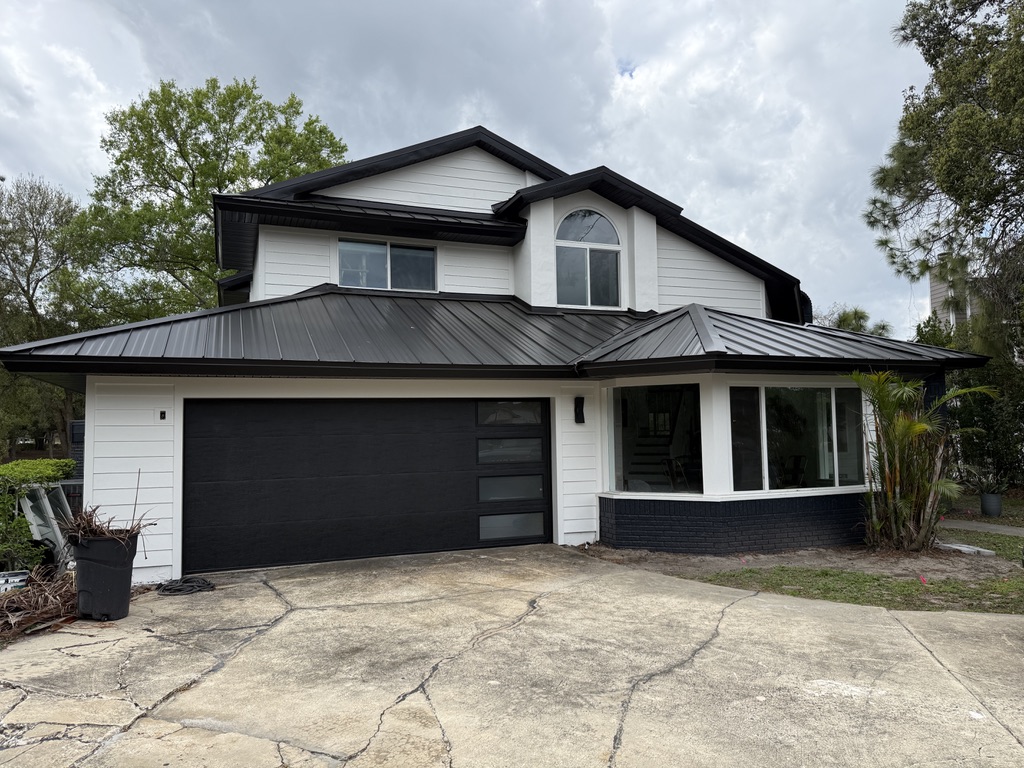 Apopka standing-seam metal roof on a two-story home